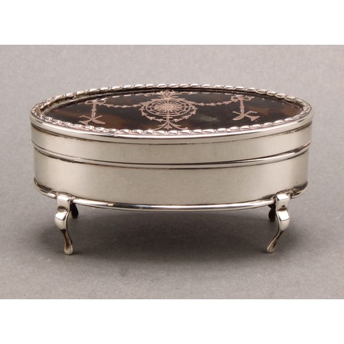 1026 - An Edward VII silver, tortoiseshell and pique oval dressing table box, hinged cover, cabriole feet, ... 