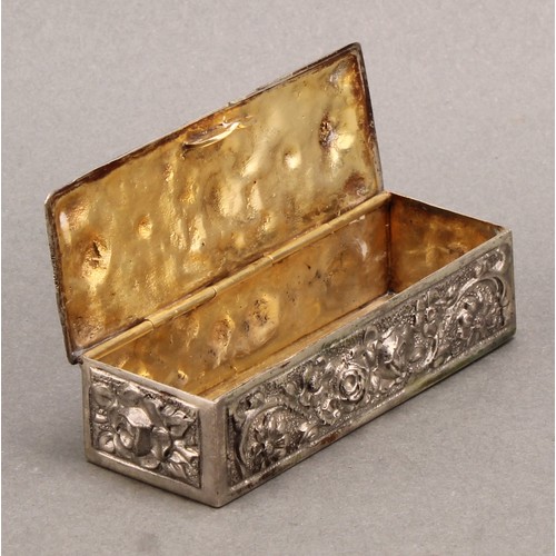 717 - A 19th century Spanish silver rectangular snuff box, in bold relief with flowers and foliage, hinged... 