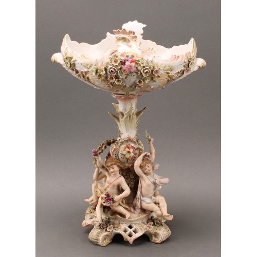 275 - A Sitzendorf porcelain figural table centrepiece or comport, the pierced oval basket, encrusted with... 