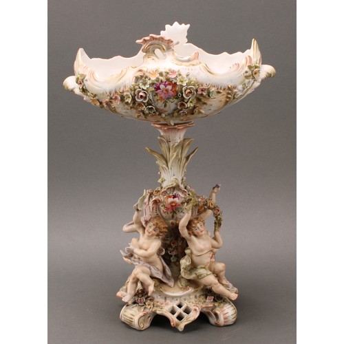 275 - A Sitzendorf porcelain figural table centrepiece or comport, the pierced oval basket, encrusted with... 