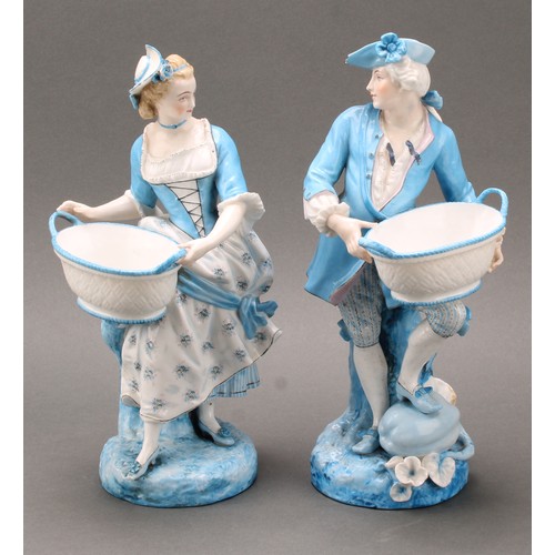 252 - A pair of French Vion & Baury porcelain figures, modelled as a maiden and gallant, wearing 18th cent... 