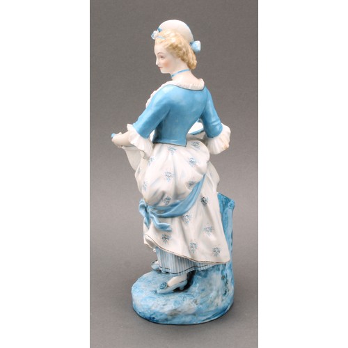 252 - A pair of French Vion & Baury porcelain figures, modelled as a maiden and gallant, wearing 18th cent... 