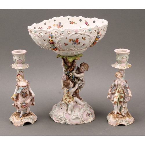 228 - A German porcelain figural table centrepiece or comport, Richard Eckert, Volkstedt, the pierced oval... 