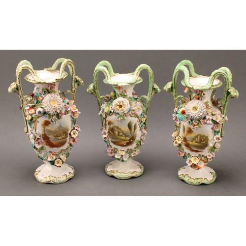 87 - A near pair of Coalbrookdale two-handled urnular vases, each painted with views and encrusted with f... 