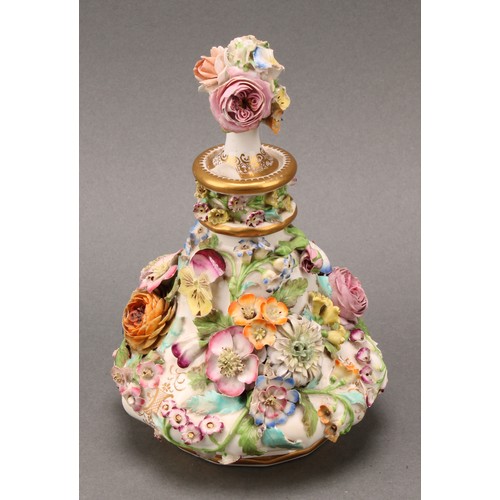 91 - A pair of Coalbrookdale porcelain pear shaped scent bottles, each encrusted in colourful summer flow... 