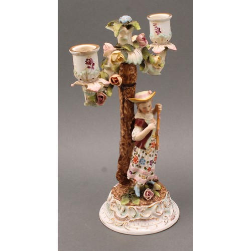 248 - A pair of Continental porcelain figural two branch candelabra, as a gallant and his companion, decor... 