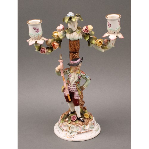 248 - A pair of Continental porcelain figural two branch candelabra, as a gallant and his companion, decor... 