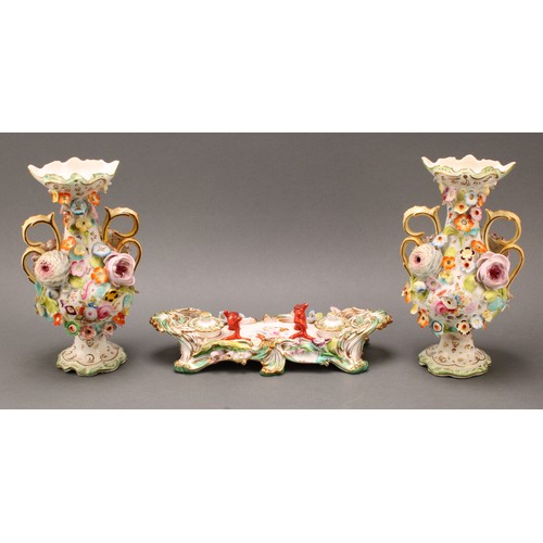 57 - A Coalbrookdale porcelain desk stand, of twin handled form, fitted with two removable inkwells, cent... 