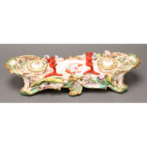 57 - A Coalbrookdale porcelain desk stand, of twin handled form, fitted with two removable inkwells, cent... 