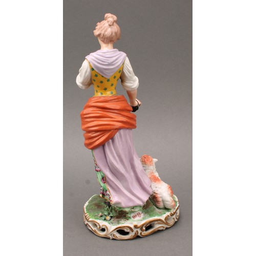 250 - A pair of French porcelain figures, of musicians, he playing the flute with a dog at his feet, she p... 