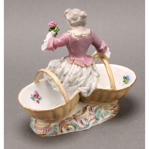 253 - A pair of German porcelain figural table salts, of a gallant and companion, each seated between two ... 