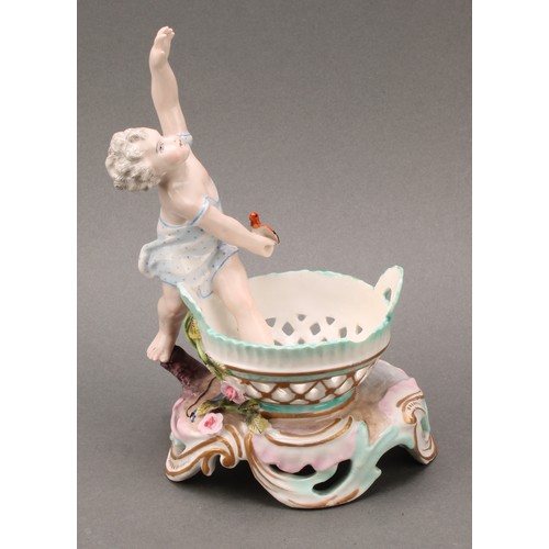 253 - A pair of German porcelain figural table salts, of a gallant and companion, each seated between two ... 