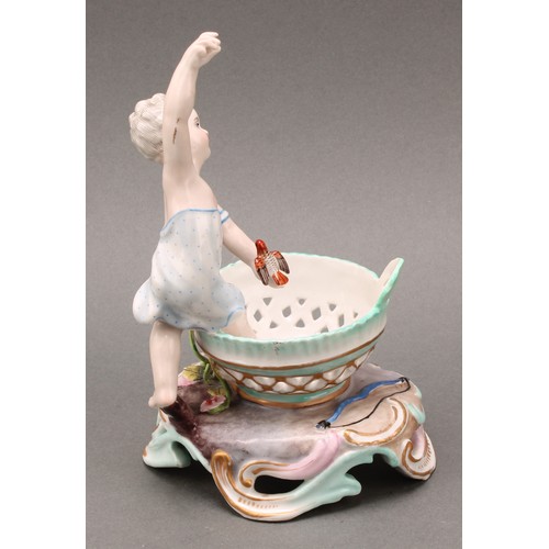 253 - A pair of German porcelain figural table salts, of a gallant and companion, each seated between two ... 