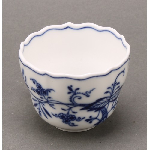 238 - A Meissen Onion pattern teacup and saucer, 10.5cm diameter, crossed swords mark in underglaze blue, ... 