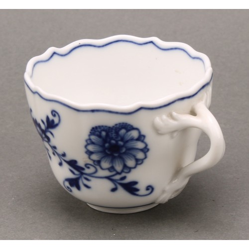 238 - A Meissen Onion pattern teacup and saucer, 10.5cm diameter, crossed swords mark in underglaze blue, ... 