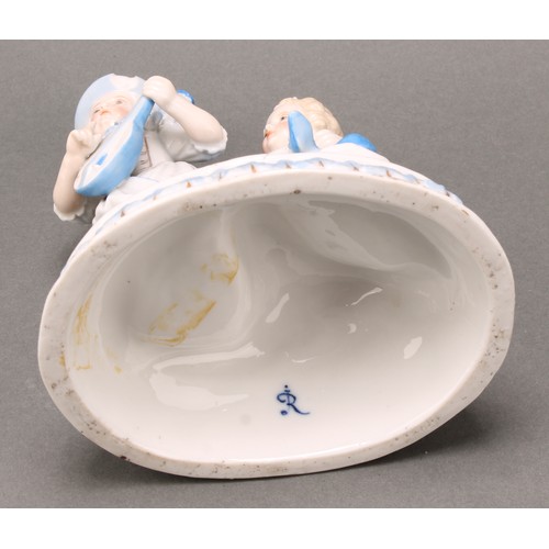 238 - A Meissen Onion pattern teacup and saucer, 10.5cm diameter, crossed swords mark in underglaze blue, ... 