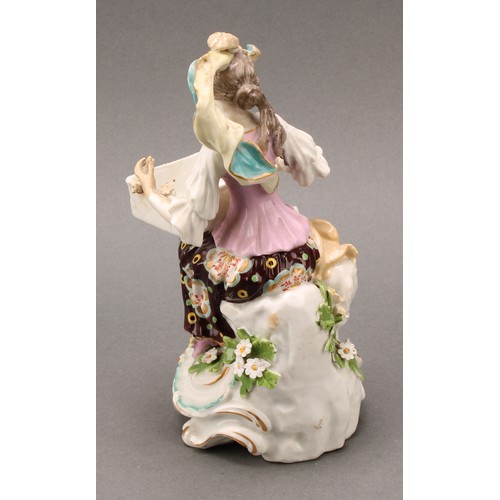 256 - A pair of Samson Paris porcelain figures, of a shepherd and shepherdess, each holding a rectangular ... 