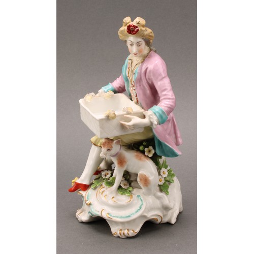 256 - A pair of Samson Paris porcelain figures, of a shepherd and shepherdess, each holding a rectangular ... 