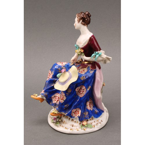 256 - A pair of Samson Paris porcelain figures, of a shepherd and shepherdess, each holding a rectangular ... 