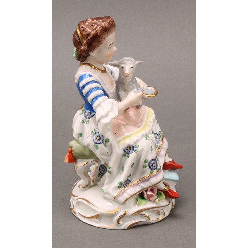 256 - A pair of Samson Paris porcelain figures, of a shepherd and shepherdess, each holding a rectangular ... 