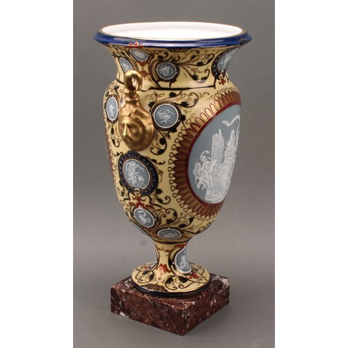 235 - A large Continental pate-sur-pate two handled pedestal vase, decorated with classical scene of a mai... 