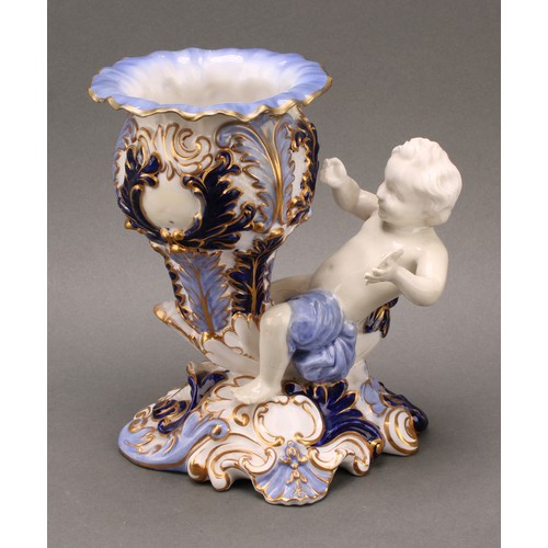 89 - A pair of 19th century Copeland figural vases, modelled as putti sitting astride a cornucopia, one h... 