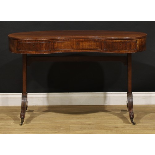 2223 - A 19th century mahogany kidney shaped library table, plum pudding veneered top with reeded edge abov... 