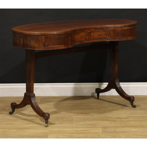 2223 - A 19th century mahogany kidney shaped library table, plum pudding veneered top with reeded edge abov... 