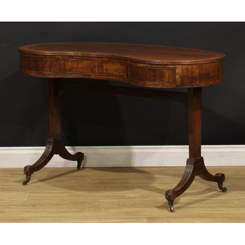 2223 - A 19th century mahogany kidney shaped library table, plum pudding veneered top with reeded edge abov... 