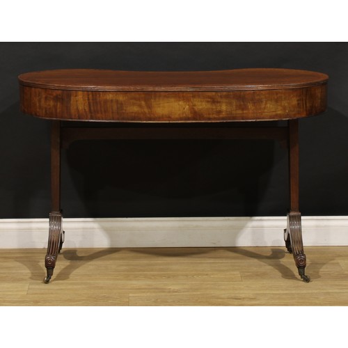 2223 - A 19th century mahogany kidney shaped library table, plum pudding veneered top with reeded edge abov... 