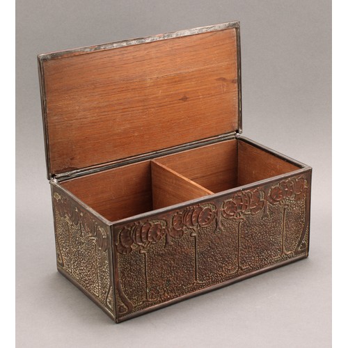 2336 - An Arts & Crafts copper mounted rectangular caddy, decorated in relief in the Art Nouveau manner wit... 