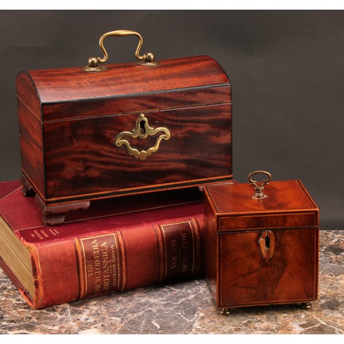 2330 - A George III mahogany domed rectangular tea caddy, hinged cover enclosing a compartmented interior, ... 