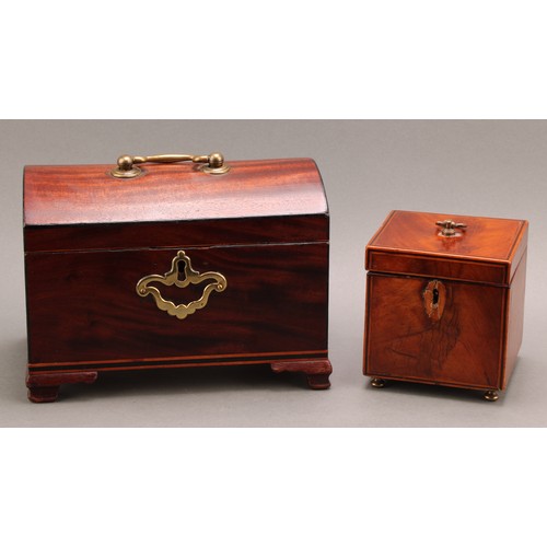 2330 - A George III mahogany domed rectangular tea caddy, hinged cover enclosing a compartmented interior, ... 