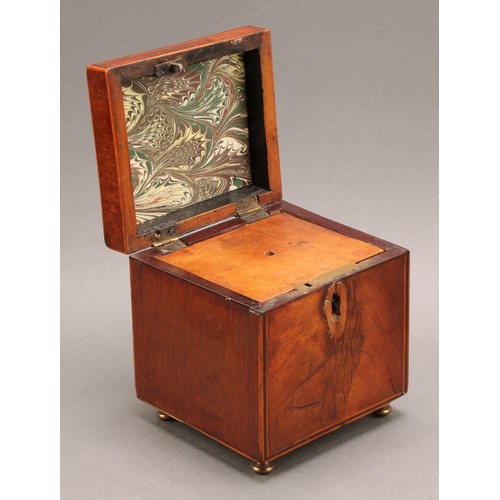 2330 - A George III mahogany domed rectangular tea caddy, hinged cover enclosing a compartmented interior, ... 