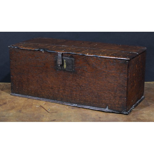 2561 - An 18th century oak six plank boarded table box, hinged cover, 26cm high, 64cm wide, 27cm deep