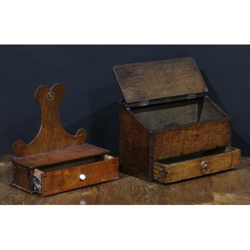 2333 - A George III oak salt or candle box, possibly Welsh, hinged sloping cover above a drawer, 24cm high,... 