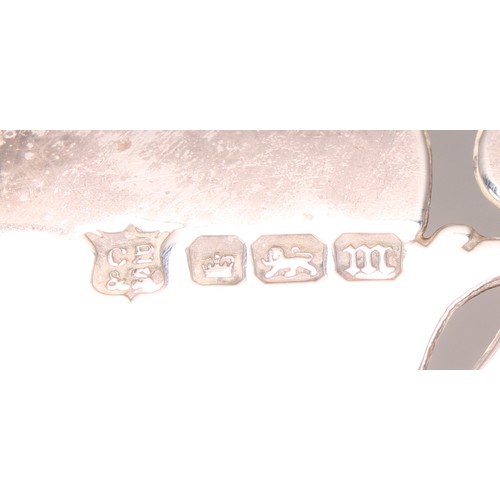 1024 - An Edward VII silver shaped circular comport, pierced with foliate scrolls, C-scroll border, spreadi... 