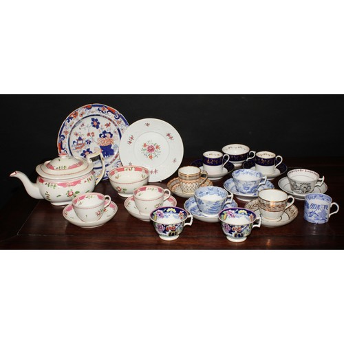 119 - English Porcelain - an early 19th century part tea service, in the manner of Newhall, comprising tea... 