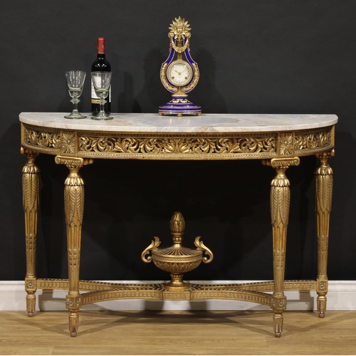 1520 - An Italian Neoclassical Revival giltwood and marble demilune pier table, oversailing top, the frieze... 