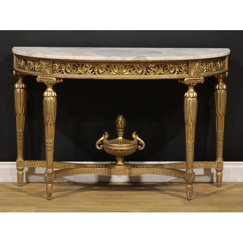 1520 - An Italian Neoclassical Revival giltwood and marble demilune pier table, oversailing top, the frieze... 