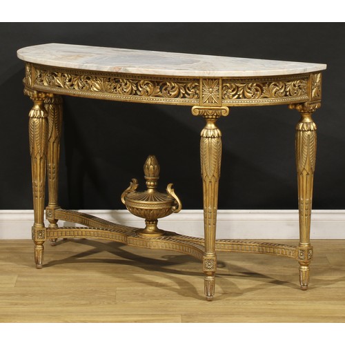 1520 - An Italian Neoclassical Revival giltwood and marble demilune pier table, oversailing top, the frieze... 