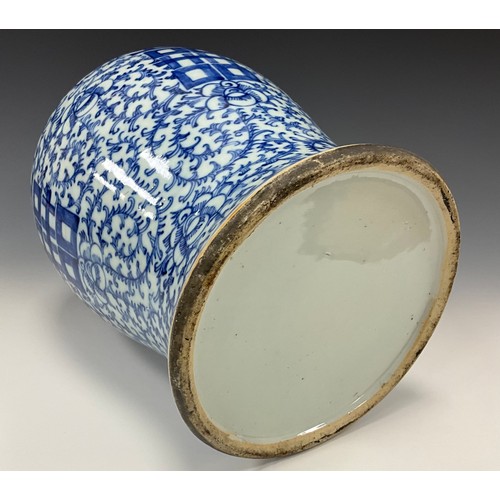 1308 - A large Chinese Qing Dynasty under-painted blue and white ginger jar, decorated with scrolling leafy... 