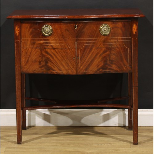 1523 - An unusual 19th century mahogany serpentine cellarette cabinet, in the Hepplewhite taste, oversailin... 