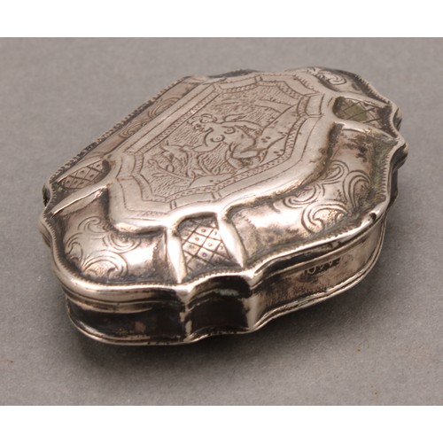 976 - An 18th century Continental silver shell shaped snuff box, hinged cover engraved with a scantily cla... 