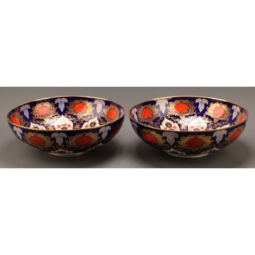 100 - A pair of large Derby Ceramic Art Studios Hamilton Imari pattern circular bowls, 34cm diameter, prin... 