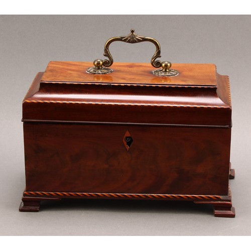 2349 - An early George III mahogany tea caddy, hinged padoda top enclosing three tin canisters, brass Rococ... 