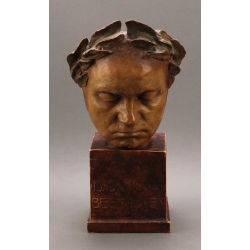 7 - A Friedrich Goldscheider Jugendstil earthenware mask on plinth, Ludvig Van Beethoven, in muted earth... 