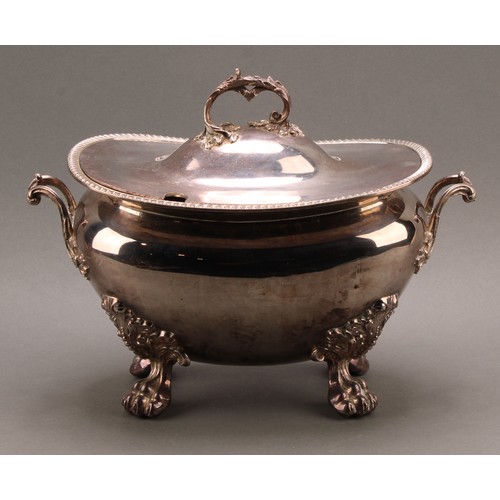 686 - A Rococo style E P on copper soup tureen and cover, leafy scroll handles, lion paw feet, 32.5cm wide