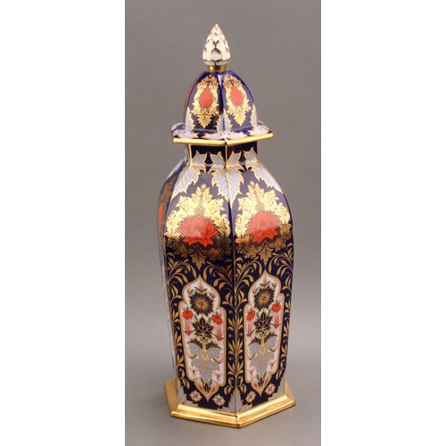 78 - A large Hamilton Derby Imari pattern hexagonal jar and cover, pine cone finial, 43cm high, printed m... 