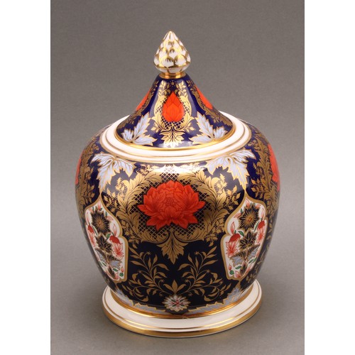 78 - A large Hamilton Derby Imari pattern hexagonal jar and cover, pine cone finial, 43cm high, printed m... 